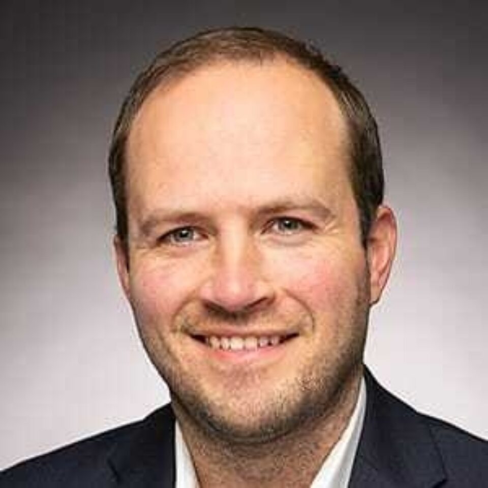 Headshot of Housing, Infrastructure and Communities Minister Nathaniel Erskine-Smith