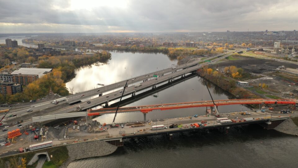An aerial view of the Montreal Réseau express métropolitain (REM) entrance via Autoroute 40