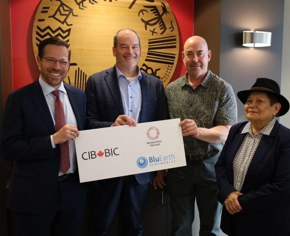 CIB CEO Ehren Cory (left) celebrates investment announcement with BluEarth CEO Grant Arnold, Chief Matt Pasco and community elder
