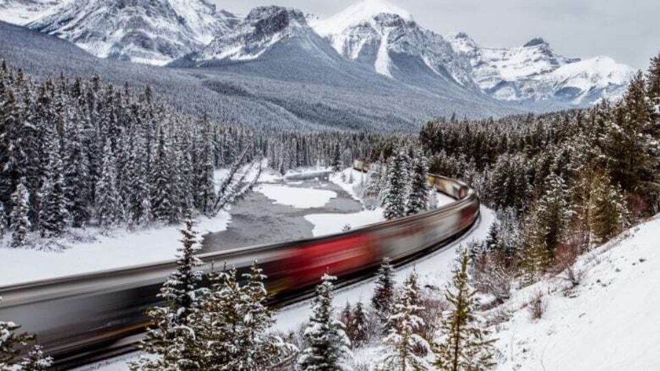 A train passing through the mountains between Calgary and Banff