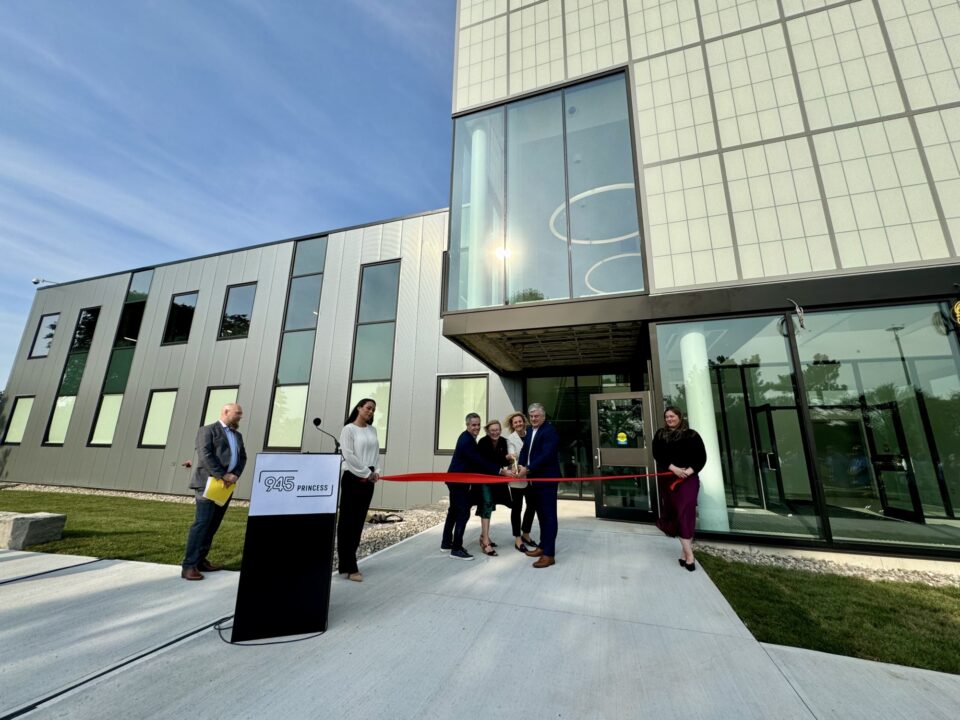 Photo from the opening ribbon cutting ceremony at 945 Princess St