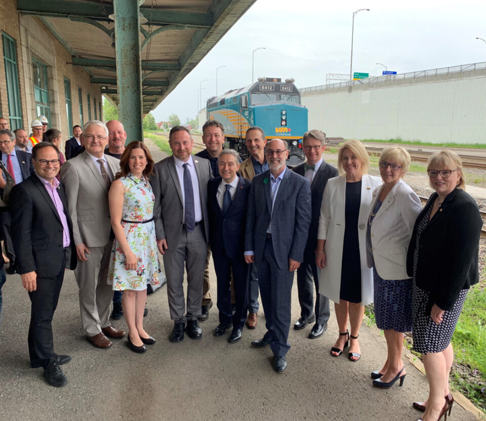 A group of people recognizing the announcement of the Via Rail HFR project