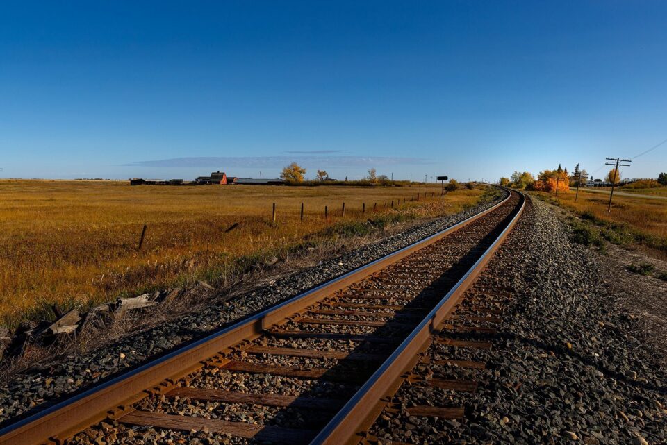 empty heavy rail tracks in the prairies