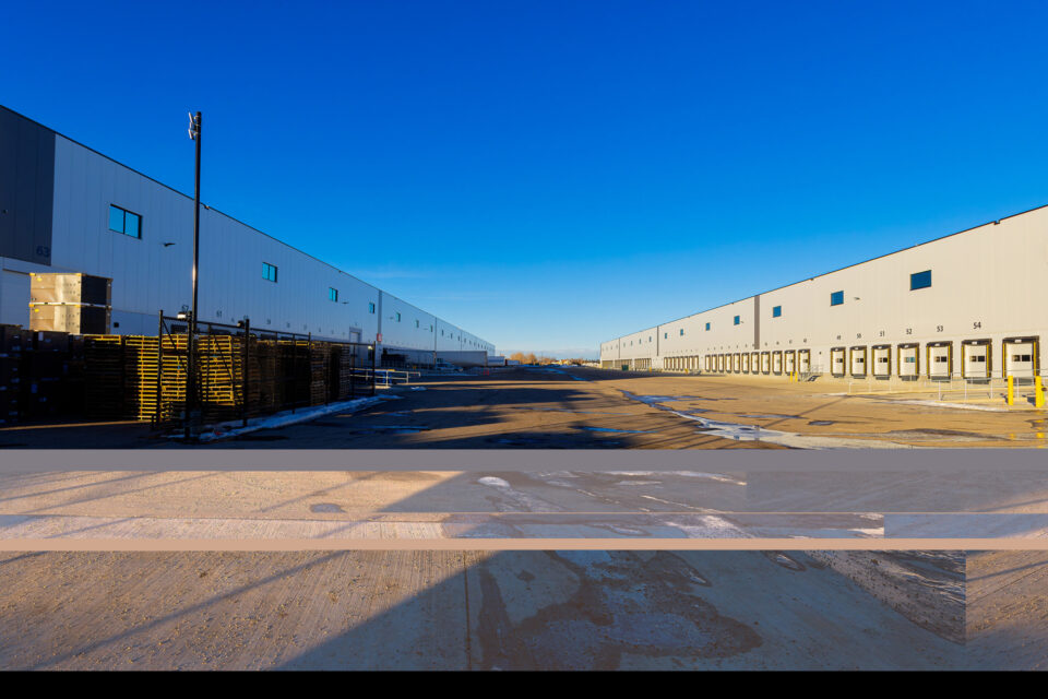 large logistics warehouses with loading and unloading bays