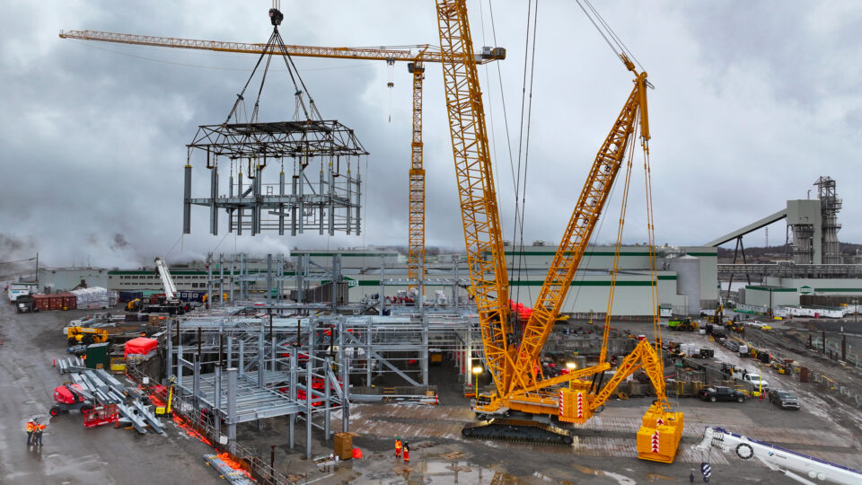 Orange cranes rise above construction work at the $1.5-billion Irving St. John Mill upgrade in this aerial view of the New Brunswick facility.